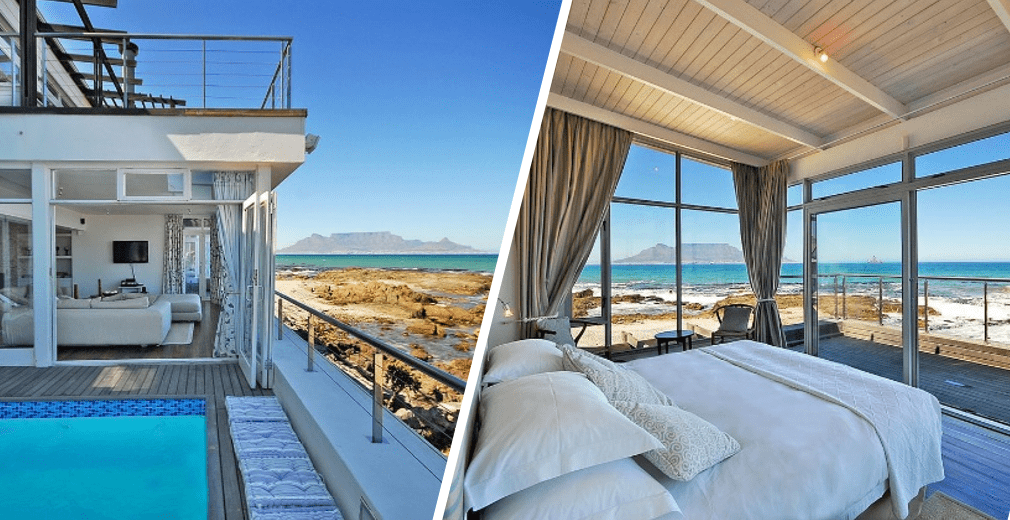 Maison de plage et sa chambre disposant d'une vue sur table mountain