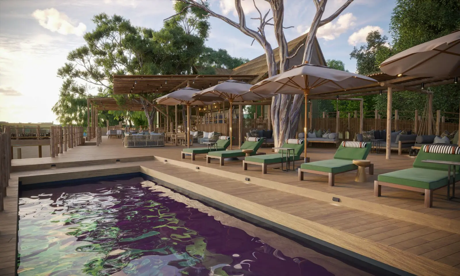 Magnifique piscine avec son deck en bois et ses transat face a la vue